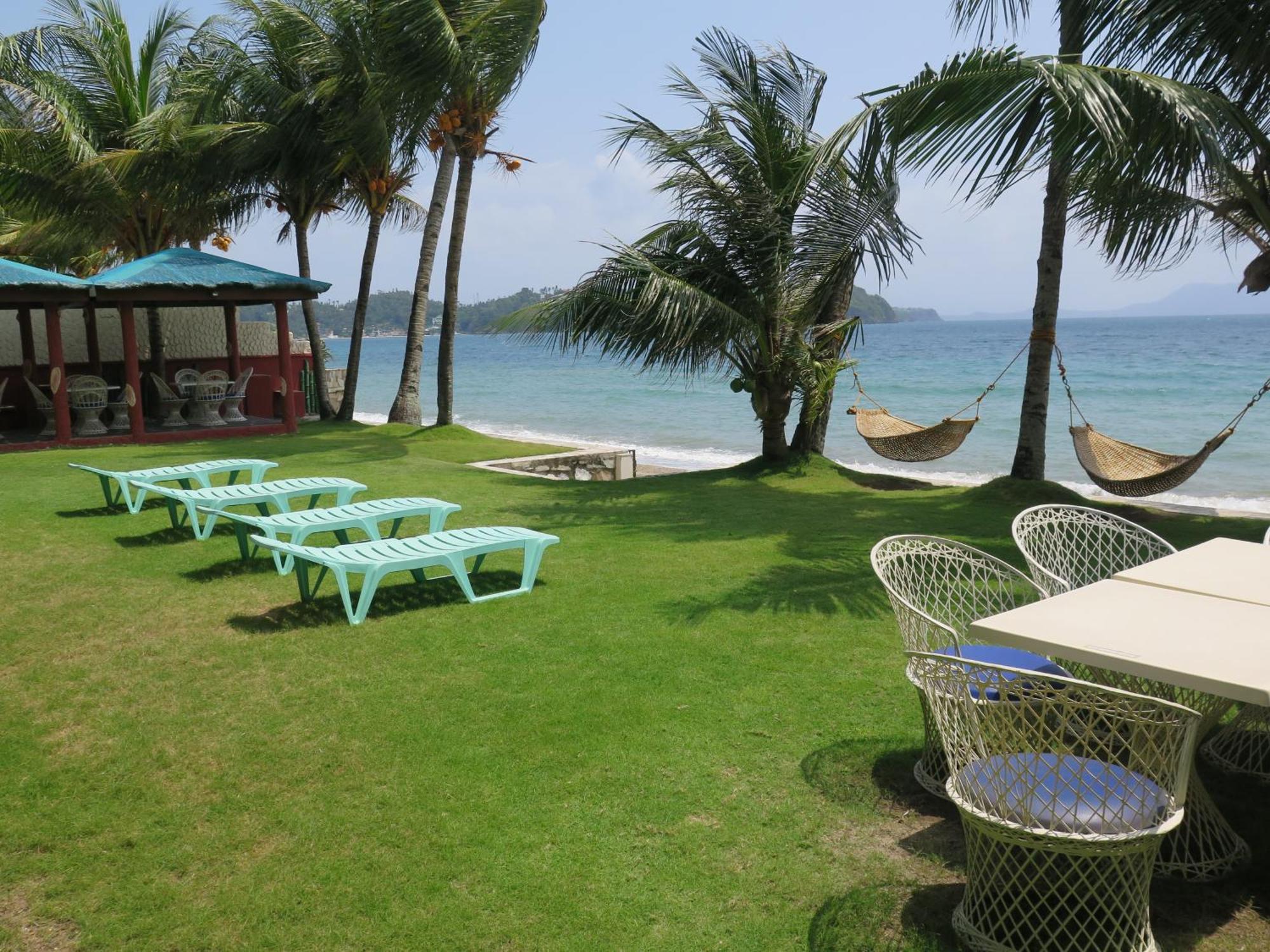 פוארטו גאלרה Badladz Beach And Dive Resort מראה חיצוני תמונה