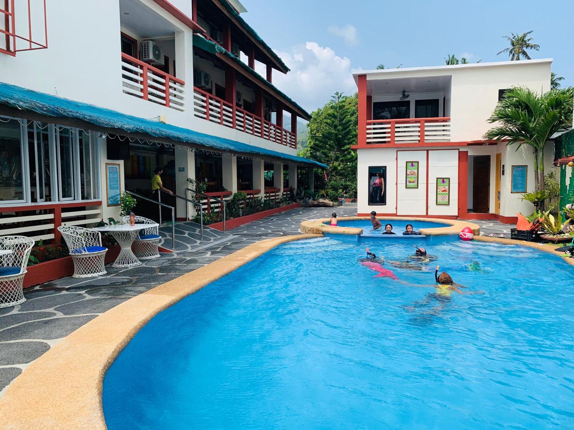 פוארטו גאלרה Badladz Beach And Dive Resort מראה חיצוני תמונה