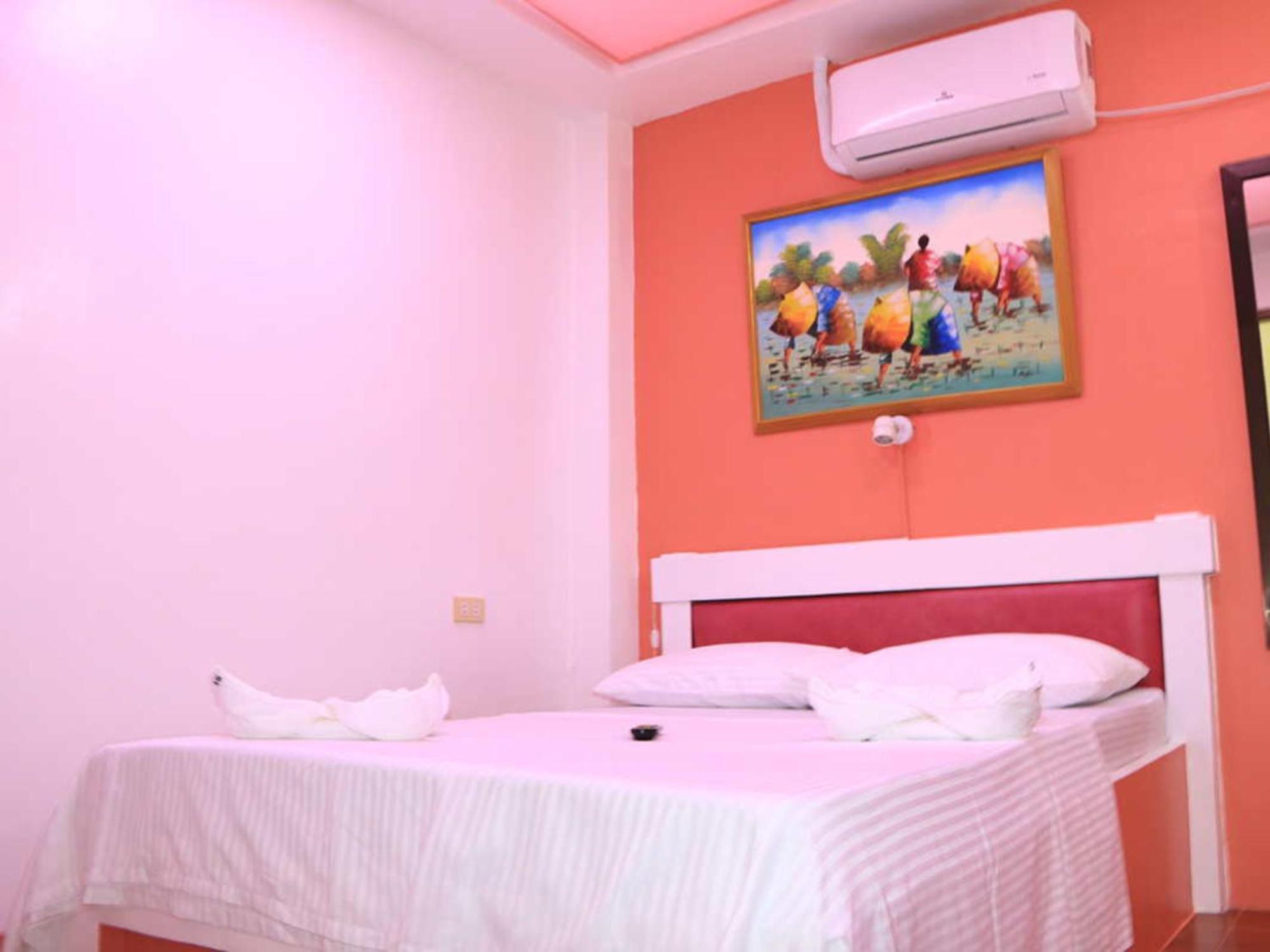 פוארטו גאלרה Badladz Beach And Dive Resort חדר תמונה