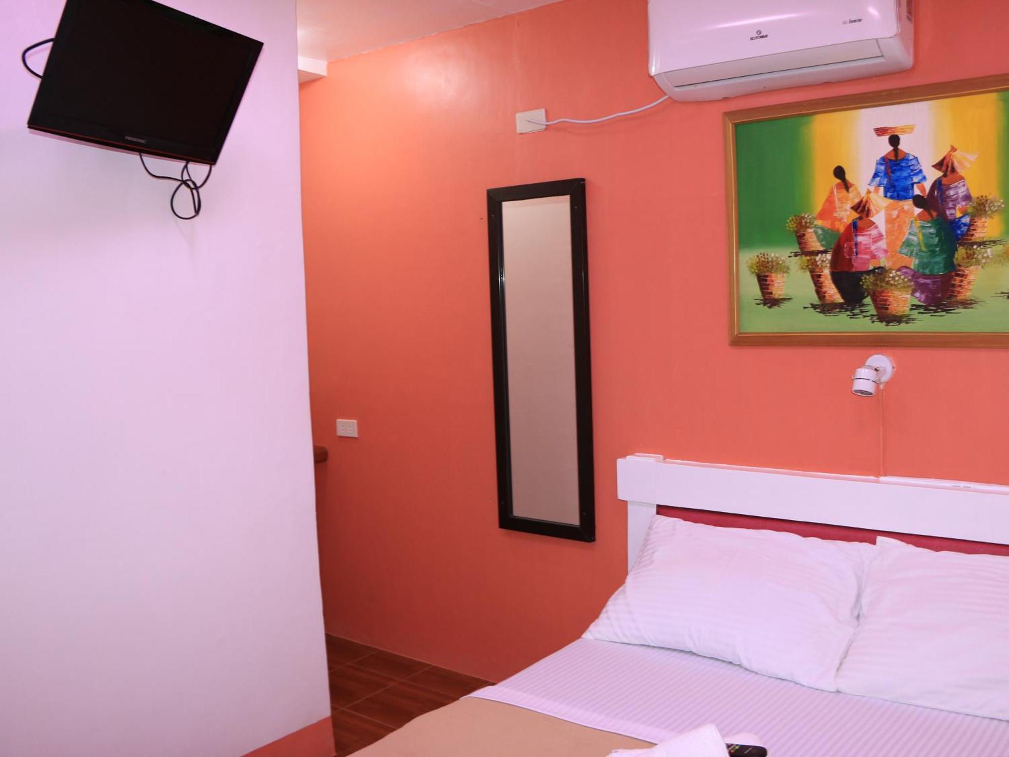 פוארטו גאלרה Badladz Beach And Dive Resort חדר תמונה