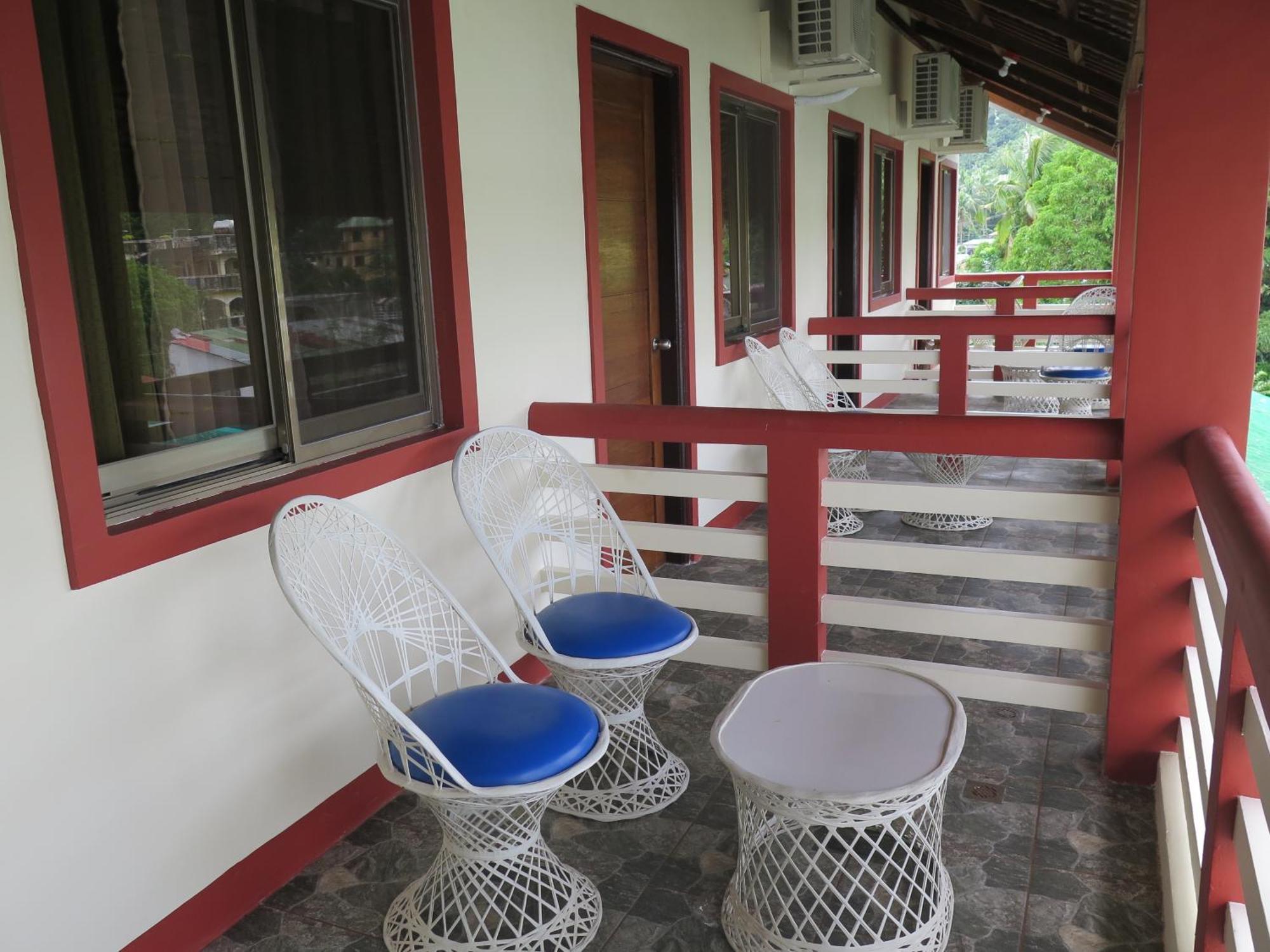 פוארטו גאלרה Badladz Beach And Dive Resort חדר תמונה